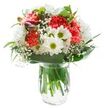 Radiating a cheerful freshness and crafted with local flair, this Radlett bouquet captures the spirit of a welcoming home. Fluffy coral carnations form the vibrant heart, their wavy, densely packed petals alive with personality. Encircling them are crisp white daisy chrysanthemums and meadowlike white daisies with vivid green-yellow centers, their gentle faces adding purity and hope. Wisps of baby's breath weave a delicate cloud, softening the ensemble and providing airiness, much like the gentle breeze found in Radlett's parks on a spring morning. On one side, the magenta buds of alstroemeria hint at blooms to come, bringing a subtle surprise of colour. Lush, varied greenery-broad, shiny leaves and slender, arching blades-surrounds the flowers, offering a deep, natural contrast. Arranged in a transparent glass vase filled with fresh water, the visible stems reinforce the bouquet's sense of newness and vitality. The brilliant, even lighting invites every shade and contour to stand out, free of shadows. Whether chosen for celebration, as a token of appreciation, or simply to brighten a day in the heart of Radlett, this bouquet extends warmth and optimism-its presence reminiscent of the comfort found in familiar local surroundings.
